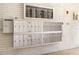 Organized mailboxes with unit numbers on a clean, well-maintained brick wall in Fordham building at 5603 80Th N St # 512, St Petersburg, FL 33709