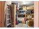 Organized storage room with shelving filled with boxes and containers, maximizing space utilization at 5603 80Th N St # 512, St Petersburg, FL 33709
