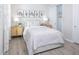 Guest bedroom with queen bed, and built in closet at 6238 Timberdale Ave, Wesley Chapel, FL 33545
