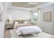 Large bedroom with plush bed, decorative wall and ceiling at 6238 Timberdale Ave, Wesley Chapel, FL 33545