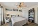 Bedroom with neutral colors, natural light, decor, and a closet at 7532 Marsh Orchid Cir # 8-201, Bradenton, FL 34203