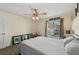 Bedroom with neutral tones, natural light, and hardwood flooring at 7532 Marsh Orchid Cir # 8-201, Bradenton, FL 34203