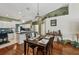 Open-concept dining area showcasing hardwood floors and natural light at 7532 Marsh Orchid Cir # 8-201, Bradenton, FL 34203