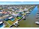 Aerial view showing homes with pools and docks on a wide canal with easy access to the open bay and ocean at 8421 Flagstone Dr, Tampa, FL 33615