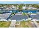 Aerial view of property showing the backyard, dock, canal, and pool at 8421 Flagstone Dr, Tampa, FL 33615