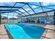 In ground pool with screened lanai and plenty of backyard space at 8421 Flagstone Dr, Tampa, FL 33615