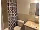 Bathroom featuring a toilet, sink, and shower/tub combination at 2042 Australia W Way # 74, Clearwater, FL 33763