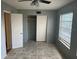 Bedroom with open closet and window at 2042 Australia W Way # 74, Clearwater, FL 33763
