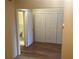 Bedroom with closet and entrance to the bathroom at 2042 Australia W Way # 74, Clearwater, FL 33763