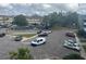 Parking lot with many cars parked, and a view of surrounding building at 2042 Australia W Way # 74, Clearwater, FL 33763