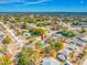 Aerial view of a quiet residential neighborhood with mature trees and well-kept homes at 10261 Horizon Dr, Spring Hill, FL 34608