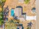 Aerial view of a home with a pool and a spacious lot at 10261 Horizon Dr, Spring Hill, FL 34608