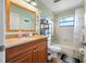 Bathroom featuring granite countertops and earth tone colors at 10261 Horizon Dr, Spring Hill, FL 34608