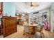 Dining area with table, chairs, and view of the screened pool and patio at 10261 Horizon Dr, Spring Hill, FL 34608