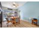 Bright dining area with access to the screened lanai and pool view at 10261 Horizon Dr, Spring Hill, FL 34608