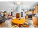 Living room that opens to the dining area and kitchen; perfect for entertaining at 10261 Horizon Dr, Spring Hill, FL 34608