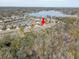 Aerial view showing house near lake in a residential neighborhood at 1045 Tracey Ann Loop, Seffner, FL 33584