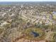 Aerial view of a residential area near a large lake at 1045 Tracey Ann Loop, Seffner, FL 33584