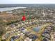 Aerial view of a home nestled in a tranquil lakefront community at 1045 Tracey Ann Loop, Seffner, FL 33584