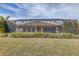 Screened patio area covering the back of the house at 1045 Tracey Ann Loop, Seffner, FL 33584