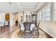 Dining room with hardwood floors and a charming chandelier at 1045 Tracey Ann Loop, Seffner, FL 33584