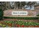 Moss Landing community entrance with stone signage and landscaping at 11206 Silver Fern Way, Riverview, FL 33569