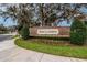 Moss Landing community entrance with stone wall and landscaping at 11206 Silver Fern Way, Riverview, FL 33569