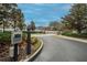 Gated community entrance to Moss Landing with security features at 11206 Silver Fern Way, Riverview, FL 33569