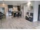 Bright kitchen featuring stainless steel appliances, an island, and dark wood cabinetry at 12368 70Th St, Largo, FL 33773