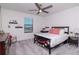 Well-lit bedroom with modern decor; perfect for relaxation at 12625 Horseshoe Bend Dr, Lithia, FL 33547