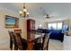 Welcoming dining area showcasing an ocean view and connecting to the living space at 13500 Gulf Blvd # 702, Madeira Beach, FL 33708