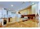 Granite countertops and warm cabinetry highlight this well-equipped kitchen space at 13500 Gulf Blvd # 702, Madeira Beach, FL 33708