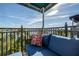 Cozy balcony seating area perfect for enjoying the surrounding scenery at 1442 Harbour Walk Rd, Tampa, FL 33602