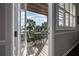 Relaxing balcony featuring a cozy seating arrangement and scenic waterfront views at 1442 Harbour Walk Rd, Tampa, FL 33602