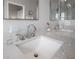 Elegant bathroom vanity features marble countertop and chrome fixtures, providing a luxurious touch at 1442 Harbour Walk Rd, Tampa, FL 33602