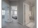 Light-filled hallway showcases bedroom and bathroom access, with neutral walls and plush carpeting at 1442 Harbour Walk Rd, Tampa, FL 33602