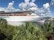 Picturesque view of the cruise ship Majesty of the Seas docked in port at 1442 Harbour Walk Rd, Tampa, FL 33602