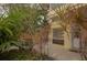 A garden view on a lovely patio with various plants and a peek at the condo building at 145 10Th N Ave # 8, St Petersburg, FL 33701