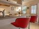 Kitchen featuring red bar stools, natural light, and open layout, great for casual dining and conversation at 145 10Th N Ave # 8, St Petersburg, FL 33701