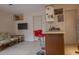 A cozy living space showcasing a kitchenette, living area, and bright decor at 145 10Th N Ave # 8, St Petersburg, FL 33701