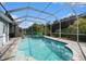 Enclosed pool area featuring a spa and plenty of space for relaxation and entertainment at 20327 Merry Oak Ave, Tampa, FL 33647