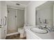 Bathroom with shower, toilet, vanity, and mirror at 2054 Envoy Ct, Clearwater, FL 33764