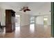 Spacious living room with tiled floors and ceiling fan at 2054 Envoy Ct, Clearwater, FL 33764