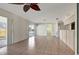 Bright living room with tile floors and sliding glass doors leading to a patio at 2054 Envoy Ct, Clearwater, FL 33764