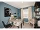 Inviting bedroom with a desk, gray walls, and natural light from a window at 2075 Hallier Cv, Wesley Chapel, FL 33543