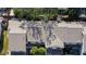 Overhead view of a well-maintained property showcasing the roof, landscaping, and surrounding neighborhood at 2559 Stony Brook Ln, Clearwater, FL 33761