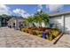 Beautiful clubhouse exterior featuring colorful landscaping, creating a welcoming community atmosphere at 2559 Stony Brook Ln, Clearwater, FL 33761