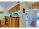 Kitchen view showing lots of cabinets with a staircase in the background at 2559 Stony Brook Ln, Clearwater, FL 33761