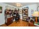 Another view of office with wood floors and a second desk at 26890 Hiawatha Blvd, Brooksville, FL 34601