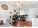 Office bedroom featuring hardwood floors, a ceiling fan, and dual workstations for a productive work environment at 2819 47Th S Ave, St Petersburg, FL 33712